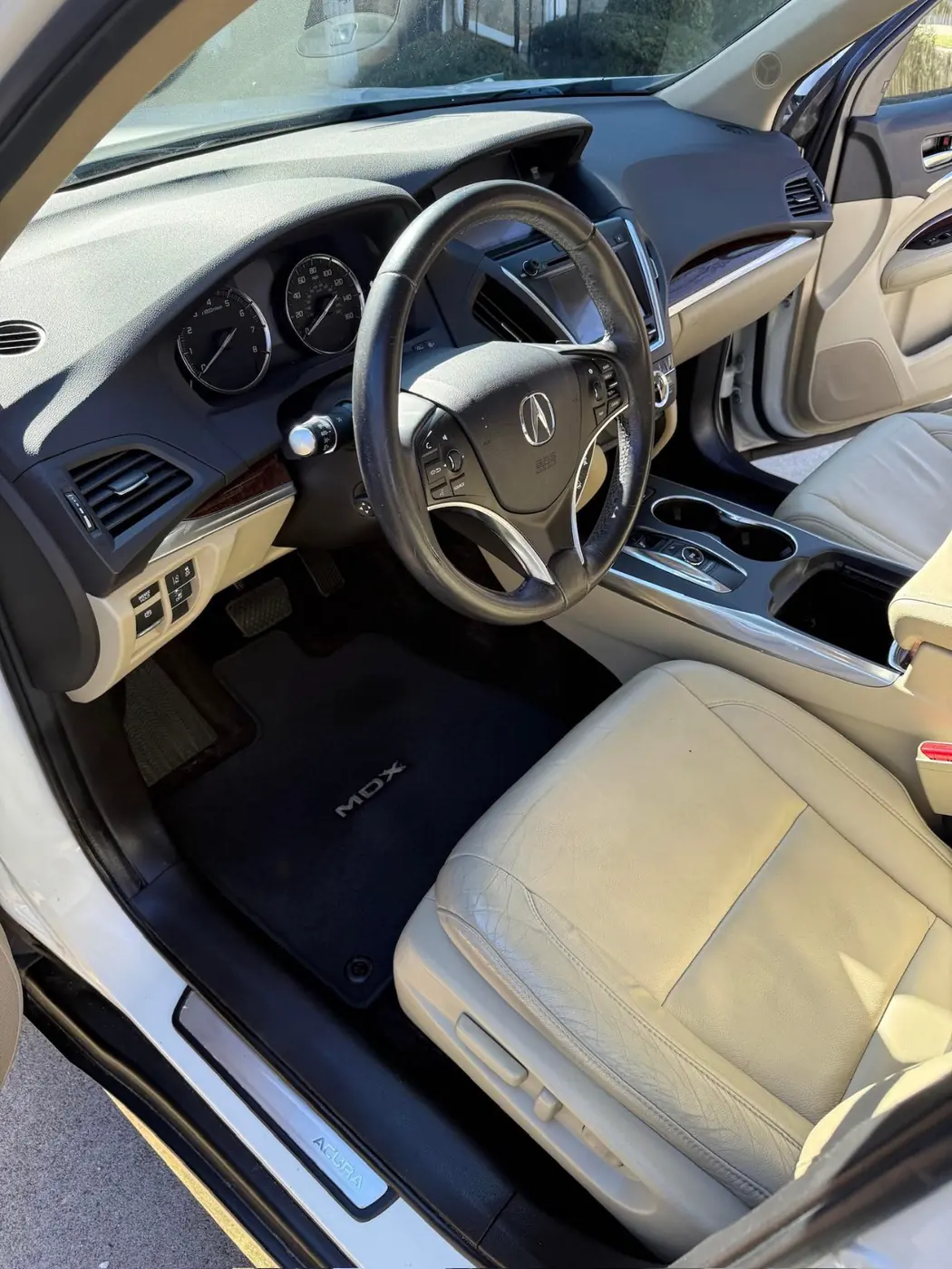 Acura front cabin with tan leather, after