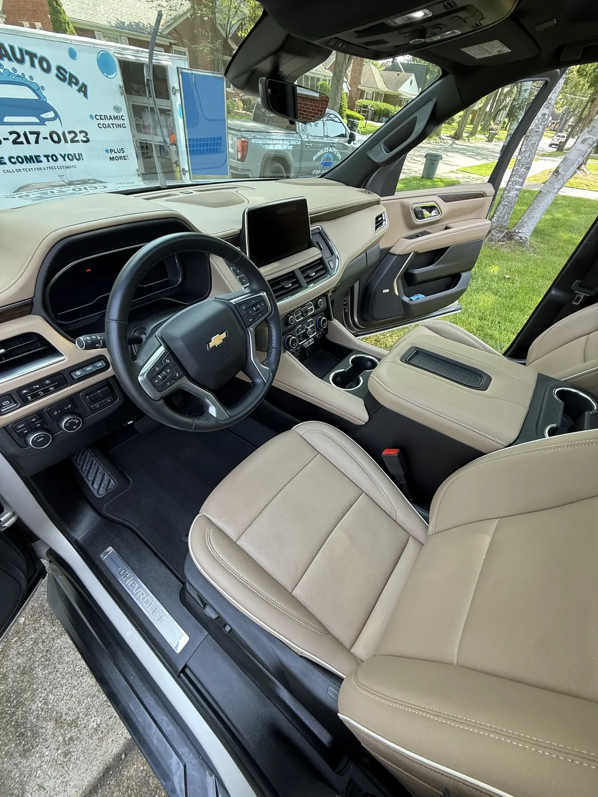 Chevrolet Tahoe interior with tan and black leather seats